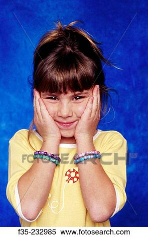 Smiling Girl with Bead Bracelets View Large Photo Image Stock Photography - Smiling Girl with Bead Bracelets. Fotosearch