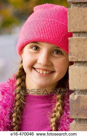 Smiling girl with hat View Large Photo Image Stock Photograph - Smiling girl with hat. Fotosearch