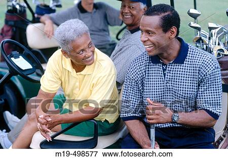 smiling golfers chatting View Large Photo Image Stock Photo - smiling golfers chatting. Fotosearch