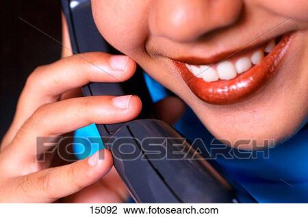Smiling lady on phone View Large Photo Image Stock Image - Smiling lady on phone. Fotosearch