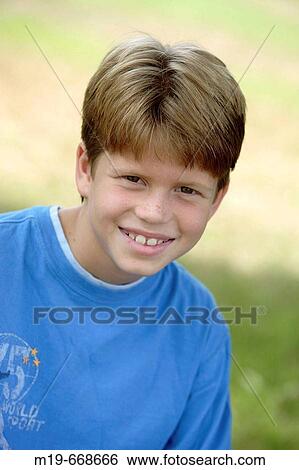 Smiling red_headed boy View Large Photo Image Stock Photograph - Smiling red_headed boy. Fotosearch