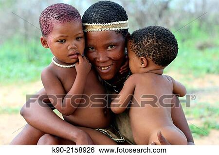 Smiling San mother with her kids, Namibia, Africa. View Large Photo Image Stock Photograph - Smiling San mother with her kids, Namibia, Africa.. Fotosearch