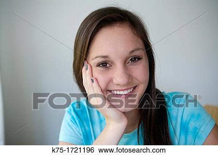 Smiling teen girl View Large Photo Image Stock Photograph - Smiling teen girl. Fotosearch