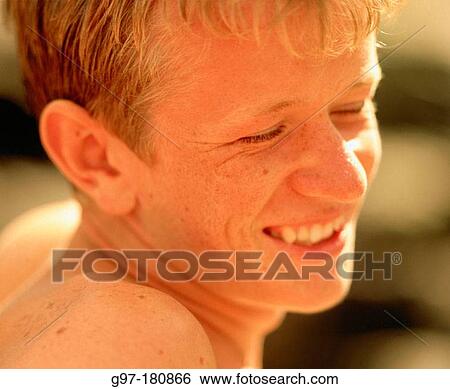 Smiling teenage boy View Large Photo Image Stock Photograph - Smiling teenage boy. Fotosearch