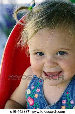 Smiling toddler girl View Large Photo Image Stock Photo - Smiling toddler girl. Fotosearch