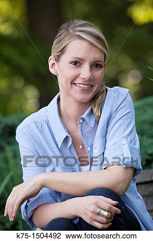 Stock Image - Smiling woman. Fotosearch