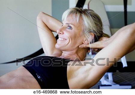 Smiling workout woman View Large Photo Image Stock Photo - Smiling workout woman. Fotosearch