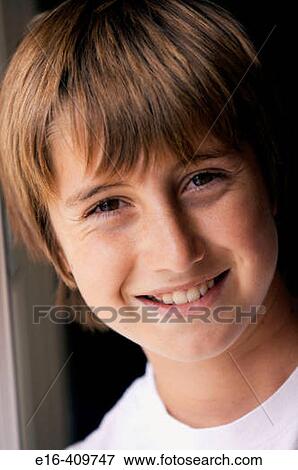 Smiling young boy View Large Photo Image Stock Photo - Smiling young boy. Fotosearch