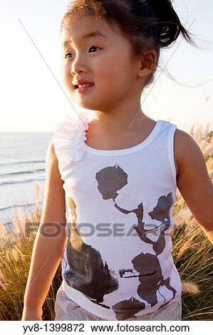 Smiling young girl View Large Photo Image Stock Image - Smiling young girl. Fotosearch