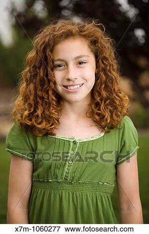 Smiling young red-headed girl Mixed race, Mexican and caucasian View Large Photo Image Stock Photo - Smiling young red-headed girl Mixed race, Mexican and caucasian. Fotosearch