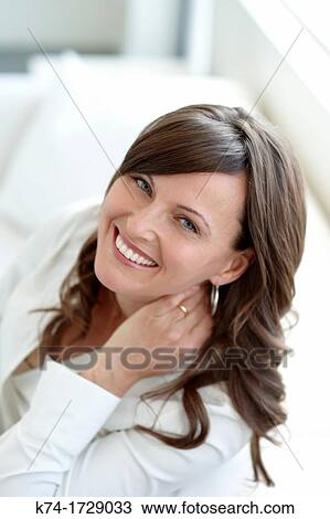 Stock Image - smiling young woman. Fotosearch