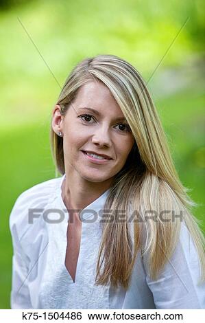 Smiling young woman View Large Photo Image Stock Photograph - Smiling young woman. Fotosearch