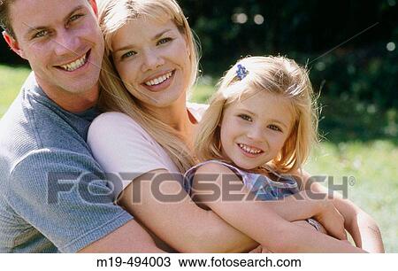 smiling/embracing family View Large Photo Image Stock Image - smiling/embracing family. Fotosearch