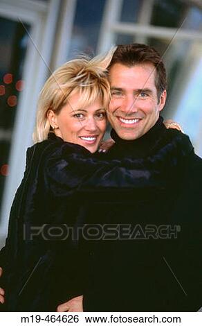 smiling/happy couple hugging View Large Photo Image Stock Photograph - smiling/happy couple hugging. Fotosearch