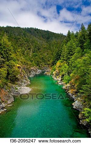 Smith River flowing through forest canyon, Del Norte County, California. View Large Photo Image Stock Photo - Smith River flowing through forest canyon, Del Norte County, California.. Fotosearch