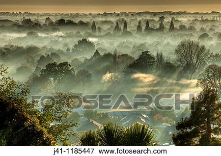 Smog, air pollution from wood and coal fires at dawn from Port Hills, Christchurch. View Large Photo Image Stock Photo - Smog, air pollution from wood and coal fires at dawn from Port Hills, Christchurch.. Fotosearch