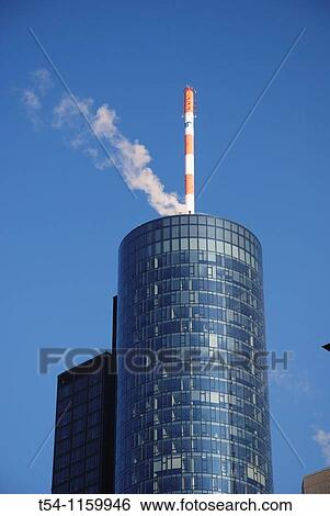 Smoke rises from the tower Helaba in Frankfurt / Main View Large Photo Image Stock Photograph - Smoke rises from the tower Helaba in Frankfurt / Main. Fotosearch