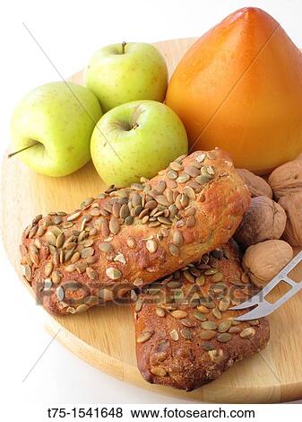 Smoked cheese, apple, seeds bread and walnuts View Large Photo Image Stock Photo - Smoked cheese, apple, seeds bread and walnuts. Fotosearch