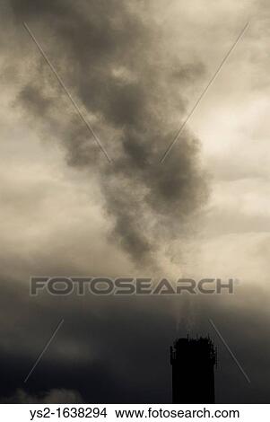 Smokestack and sky View Large Photo Image Picture - Smokestack and sky. Fotosearch
