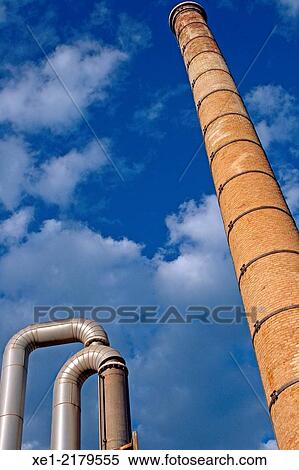 Smokestack, distillery Anis del Mono, Badalona, Catalonia, Spain View Large Photo Image Stock Photography - Smokestack, distillery Anis del Mono, Badalona, Catalonia, Spain. Fotosearch