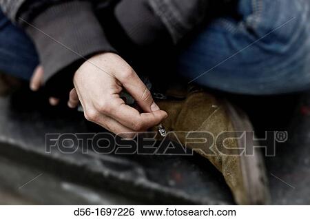 Smoking a cigarette View Large Photo Image Stock Photograph - Smoking a cigarette. Fotosearch