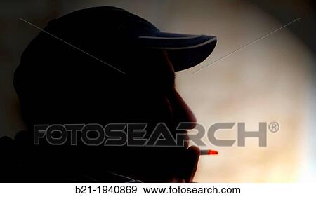 Stock Photo - Smoking cigarette. Fotosearch