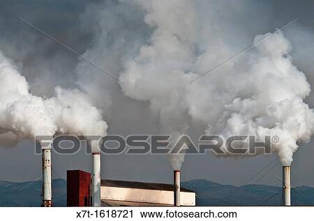 Smoking factory chimneys at Nafplio, Argolid, Peloponnese, Greece View Large Photo Image Stock Image - Smoking factory chimneys at Nafplio, Argolid, Peloponnese, Greece. Fotosearch