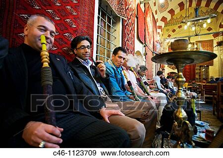 Smoking Narghiles. Grand Bazaar. Istanbul. Turkey. View Large Photo Image Stock Photo - Smoking Narghiles. Grand Bazaar. Istanbul. Turkey.. Fotosearch