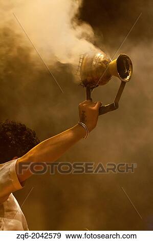 Smoking Pot during Hindu Ceremony in Varanasi, India View Large Photo Image Stock Photo - Smoking Pot during Hindu Ceremony in Varanasi, India. Fotosearch