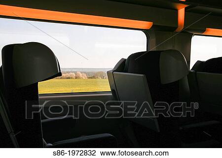 SNCF High Speed Train Traveling Through the French Countryside from Reims to Paris. View from the Interior Window. View Large Photo Image Stock Image - SNCF High Speed Train Traveling Through the French Countryside from Reims to Paris. View from the Interior Window.. Fotosearch
