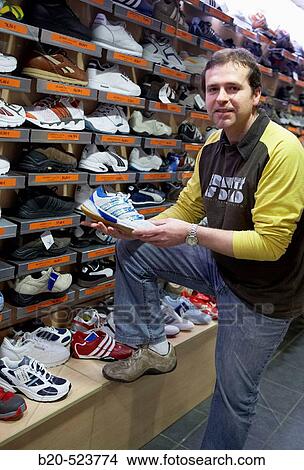 Picture - Sneakers. Sports clothing shop. Elgoibar, Gipuzkoa, Euskadi. Spain.. Fotosearch