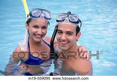 snorkeling couple in a pool View Large Photo Image Stock Photography - snorkeling couple in a pool. Fotosearch