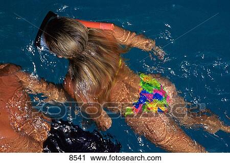 Snorkeling in clear water View Large Photo Image Stock Image - Snorkeling in clear water. Fotosearch