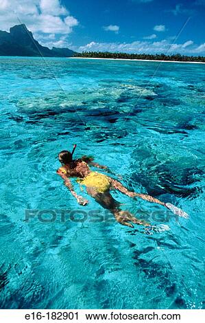 Stock Image - Snorkeling in Tahiti. Fotosearch