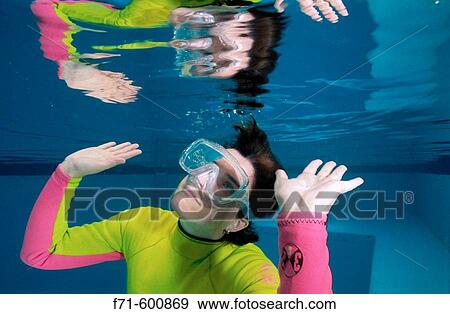 Stock Photo - Snorkeller in swimming pool. Fotosearch