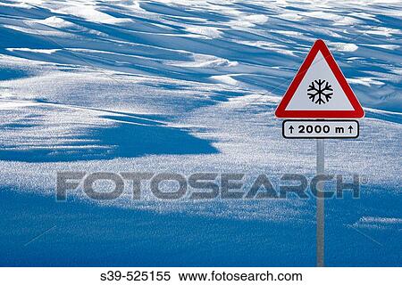 Stock Photography - Snow and danger sign.. Fotosearch
