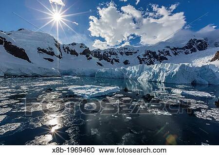Snow-capped mountains in the Errera Channel on the western side of the Antarctic Peninsula, Southern Ocean. View Large Photo Image Stock Image - Snow-capped mountains in the Errera Channel on the western side of the Antarctic Peninsula, Southern Ocean.. Fotosearch
