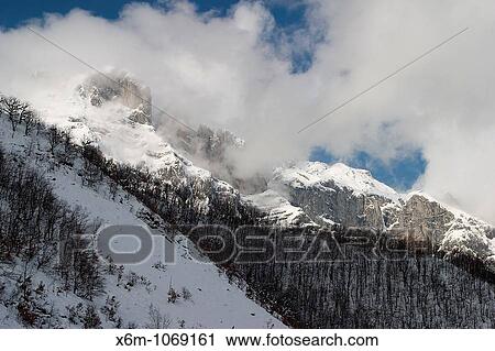 Stock Image - snow-capped mountains landscape Picos de Europa National Park Cantabria Spain Europe. Fotosearch