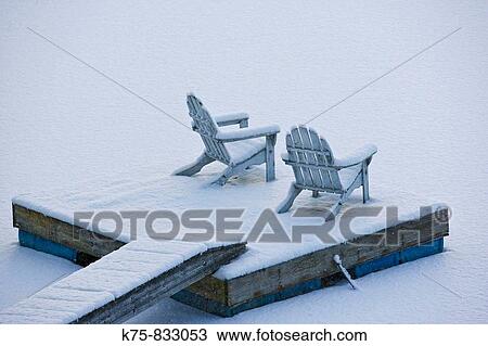 Snow covered adirondack chairs View Large Photo Image Stock Image - Snow covered adirondack chairs. Fotosearch