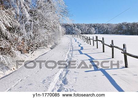Snow Covered Winter Landscape with Snowshoe Trail, Wuestensachsen, Rhoen Mountain, Hesse, Germany View Large Photo Image Stock Photography - Snow Covered Winter Landscape with Snowshoe Trail, Wuestensachsen, Rhoen Mountain, Hesse, Germany. Fotosearch