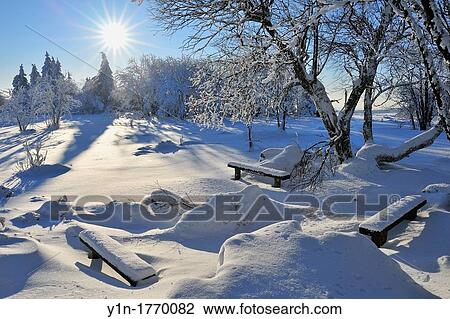 Snow Covered Winter Landscape with Sun, Heidelstein, Rhoen Mountain, Bavaria, Germany View Large Photo Image Stock Image - Snow Covered Winter Landscape with Sun, Heidelstein, Rhoen Mountain, Bavaria, Germany. Fotosearch