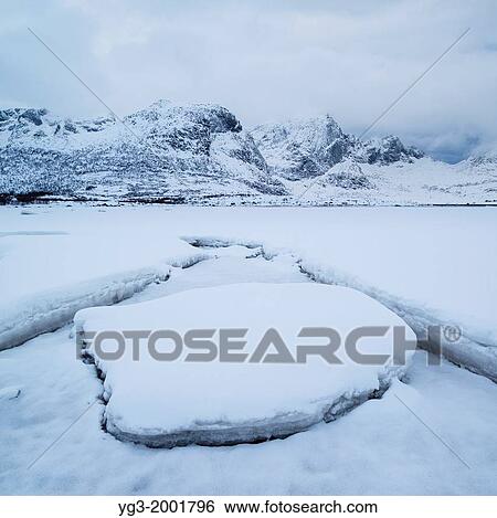 Snow covers sea ice in inner Flakstadpollen, Kilan, Flakstadoy, Lofoten Islands, Norway View Large Photo Image Stock Photograph - Snow covers sea ice in inner Flakstadpollen, Kilan, Flakstadoy, Lofoten Islands, Norway. Fotosearch