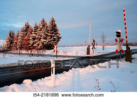 Snow on a level crossing in Bavaria View Large Photo Image Stock Photograph - Snow on a level crossing in Bavaria. Fotosearch