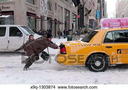 Snow Storm, December 26, 2010, New York City, 5th Avenue, 59th Street vicinity, Manhattan View Large Photo Image Picture - Snow Storm, December 26, 2010, New York City, 5th Avenue, 59th Street vicinity, Manhattan. Fotosearch