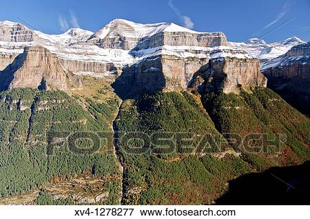 Stock Photo - Snowcapped mountain landscape at Ordesa & Monte Perdido National Park Huesca Aragon Spain. Fotosearch