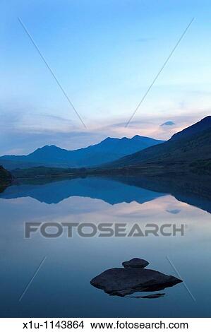 Snowdon Horseshoe at sunset from Llynnau Mymbyr Conwy Wales View Large Photo Image Picture - Snowdon Horseshoe at sunset from Llynnau Mymbyr Conwy Wales. Fotosearch