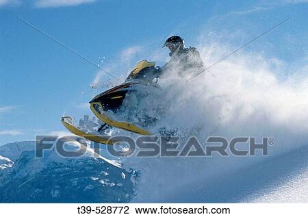Snowmobiling. Rainbow Range, British Columbia, Canada View Large Photo Image Stock Image - Snowmobiling. Rainbow Range, British Columbia, Canada. Fotosearch