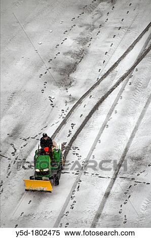 Snowplow - snow removal vehicle used during blizzards, snow covered town of Geneva, Switzerland View Large Photo Image Stock Photography - Snowplow - snow removal vehicle used during blizzards, snow covered town of Geneva, Switzerland. Fotosearch