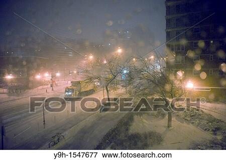 Snowplows travel down Ninth Avenue in the Chelsea neighborhood of New York View Large Photo Image Stock Photo - Snowplows travel down Ninth Avenue in the Chelsea neighborhood of New York. Fotosearch