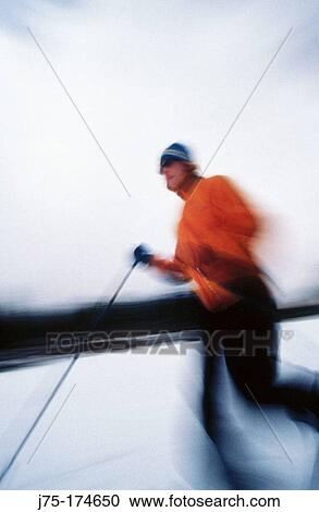 Stock Image - Snowshoeing. Fotosearch